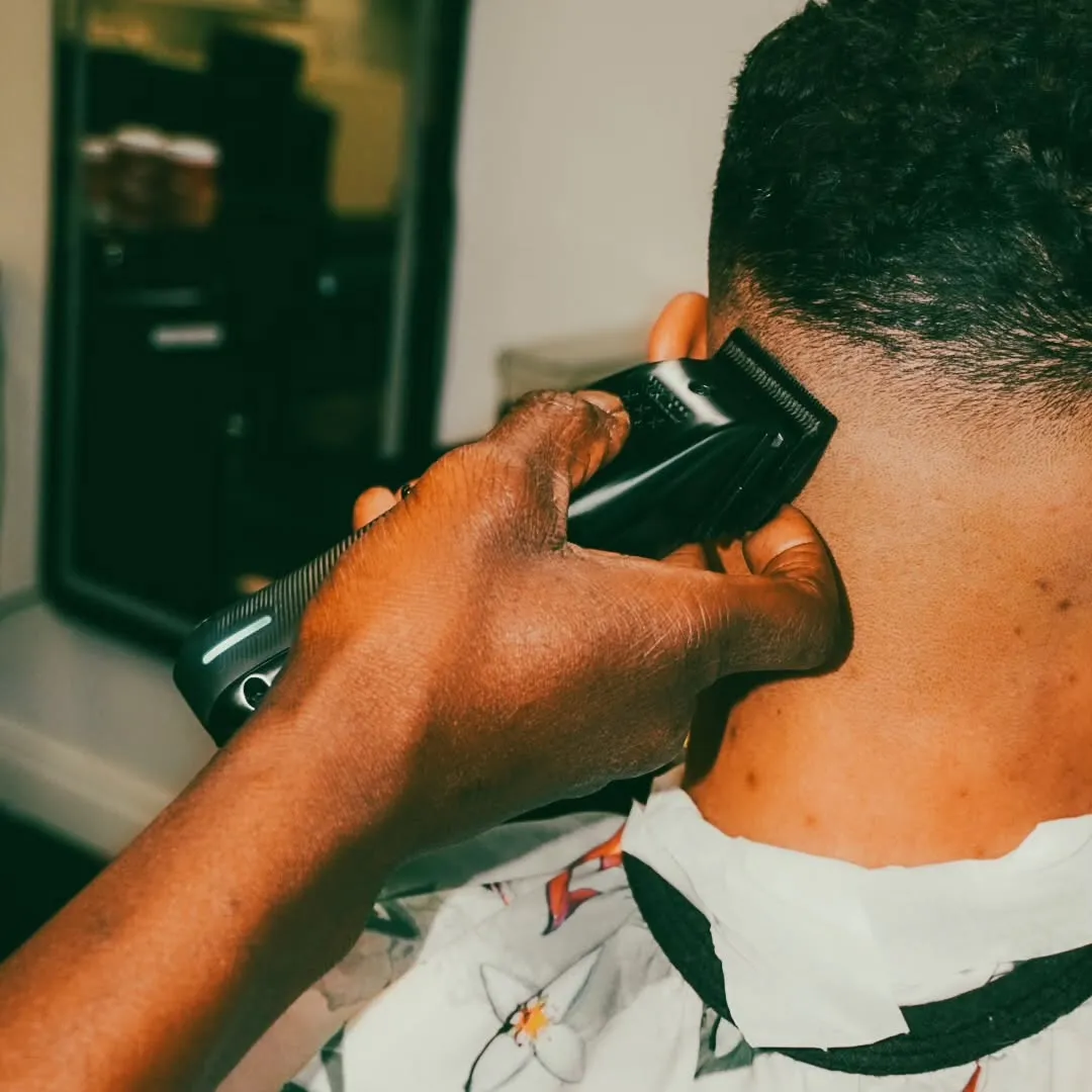 Close-up of precision clipper fade work at Barberhood Toronto