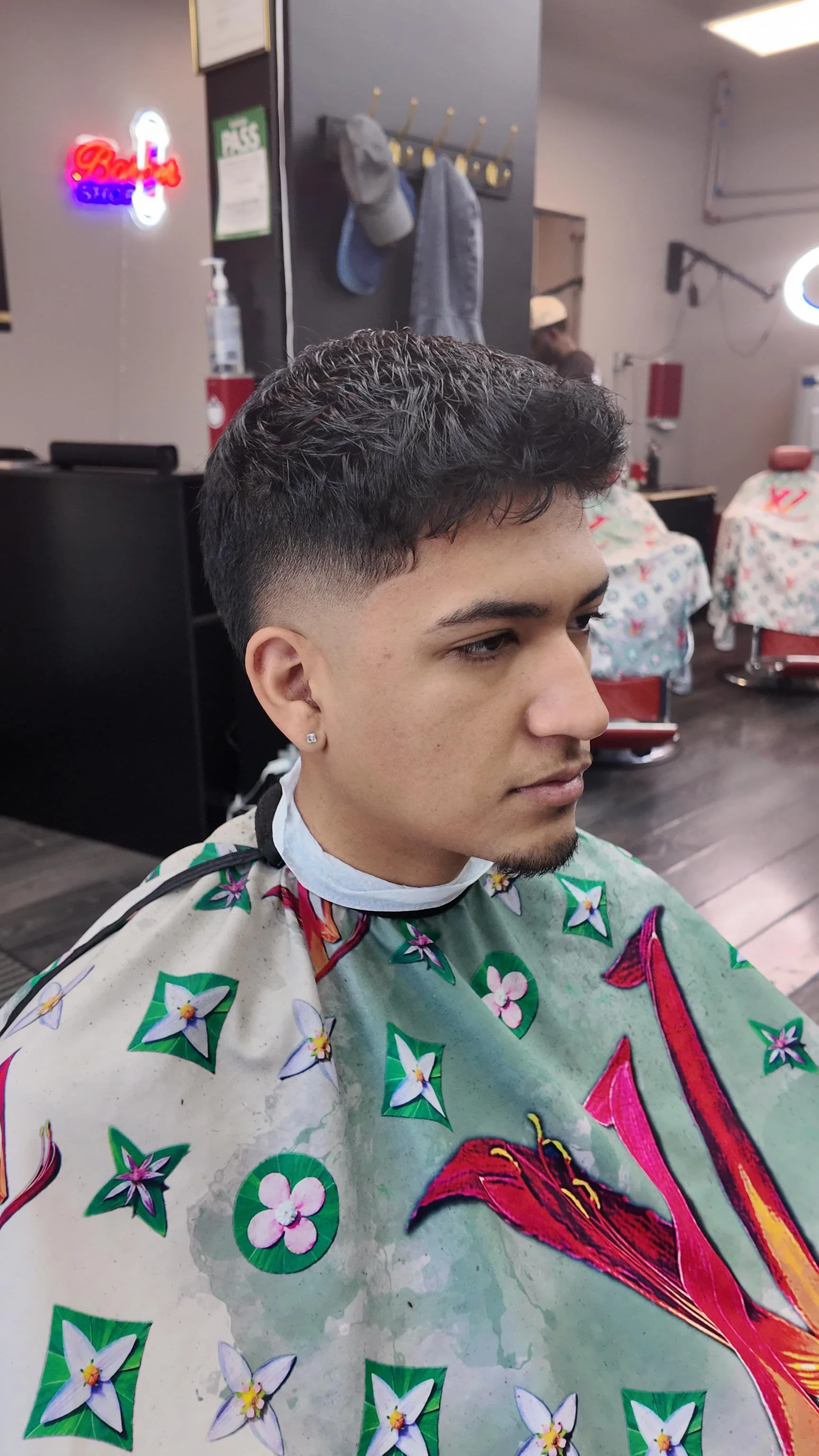 A young client with a finished haircut at Barberhood York U