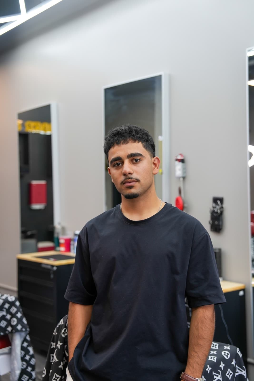 Mido inside the Barberhood York U shop